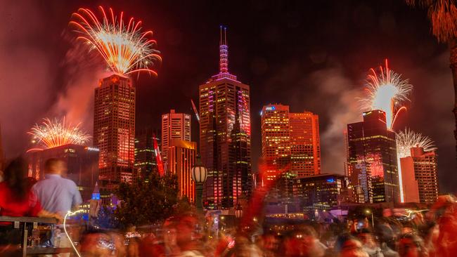 Revellers ring in the New Year watching the show. Picture: Mark Stewart