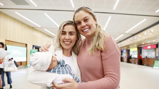 Chanyce Turnbull is reunited with best friend Amy Bowerman and her 2 week old son Bailey Gowans. Picture: Zak Simmonds