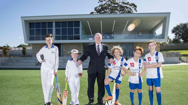 Harrison Brown, Sam Newson-Smith, Lord Mayor of Parramatta Bob Dwyer, Brodie Strauss, Alex Brown and Marcus Brown pose in front of the new West Epping Park pavilion Picture: Troy Snook