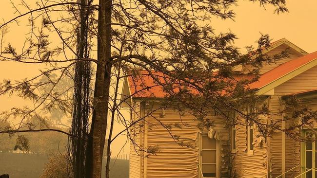 Bushfire damage to homes at Willawarrin, West of Kempsey.