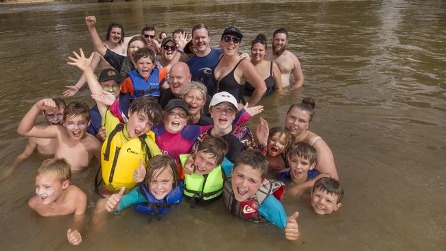 Families enjoy a cool-down in the Murray River at Echuca. Picture: Rob Leeson