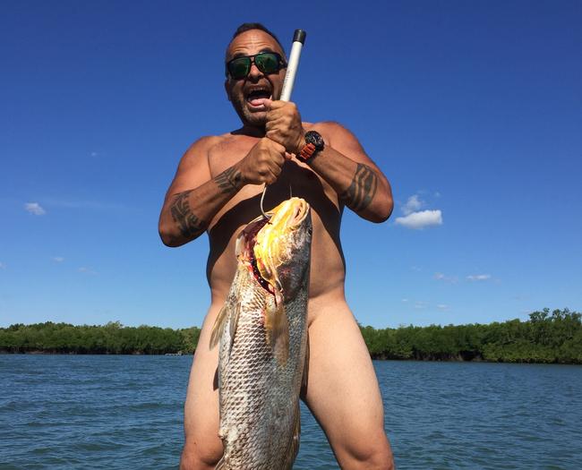 Nude fisho poses after catching a huge Jewfish near Wagait Beach | NT News