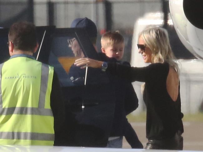 Roxy with Curtis after their private plane landed in Sydney from Cooma. Picture: Brianne Makin