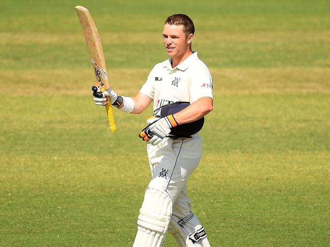 Marcus Harris celebrates bringing up his century against Queensland. Picture: Getty Images 