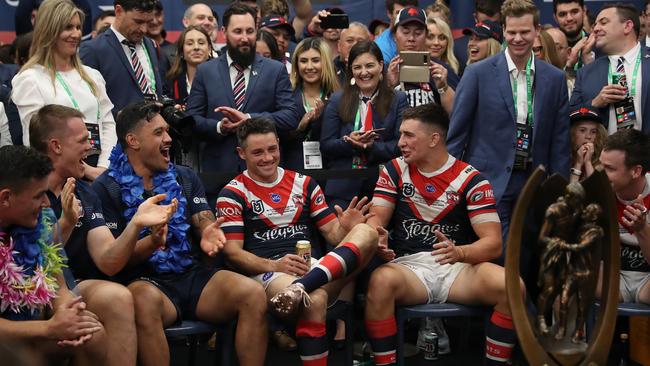 Smith celebrates with Cooper Cronk and Victor Radley. Picture: Brett Costello