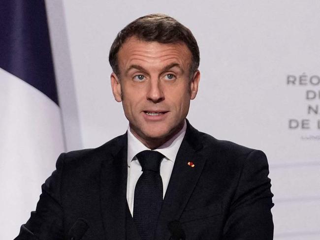 French President Emmanuel Macron delivers a speech after visiting the National Maritime Museum (Musee national de la Marine), the day of its reopening after six years of renovation, in Paris, on November 27, 2023. (Photo by Christophe Ena / POOL / AFP)