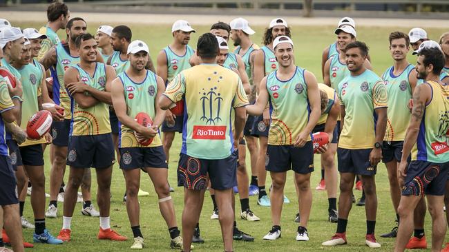 Players listen in at AFL Indigenous All Stars training at Park 10 in Adelaide. Picture: AAP/MIKE BURTON