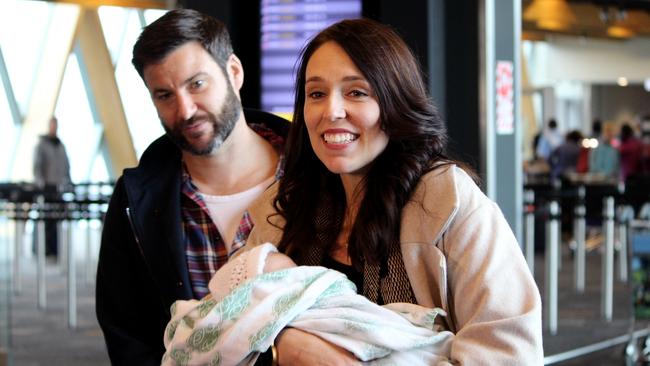 New Zealand Prime Minister Jacinda Ardern with Neve, and Clarke Gayford at Wellington Airport in 2018.