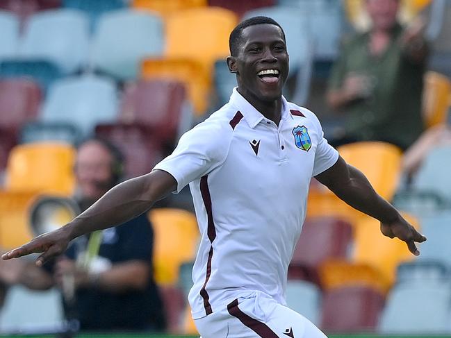 BRISBANE, AUSTRALIA - JANUARY 28: Shamar Joseph of the West Indies celebrates victory after taking the wicket of Josh Hazlewood of Australia during day four of the Second Test match in the series between Australia and West Indies at The Gabba on January 28, 2024 in Brisbane, Australia. (Photo by Bradley Kanaris/Getty Images)