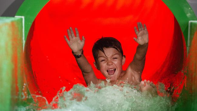 Conor, 8, is the first kid to try Melbourne’s newest water slide. Picture: Jay Town