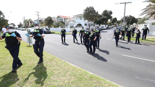 A heavy police presence stormed the busy park within minutes of the protesters arriving. Picture: Alex Coppel.