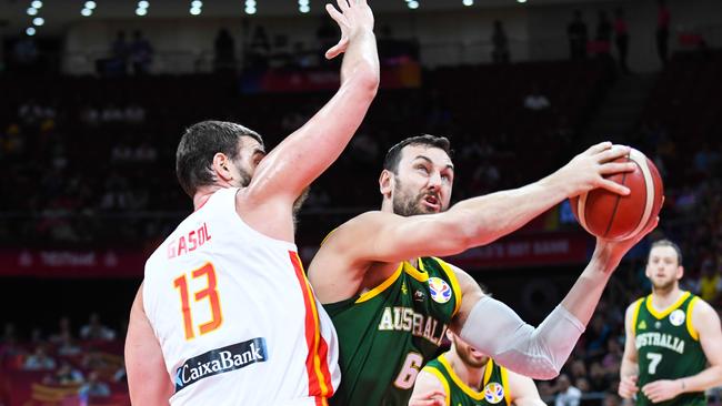 Andrew Bogut looks to get past Spain’s Marc Gasol on Friday night. Picture: Getty Images