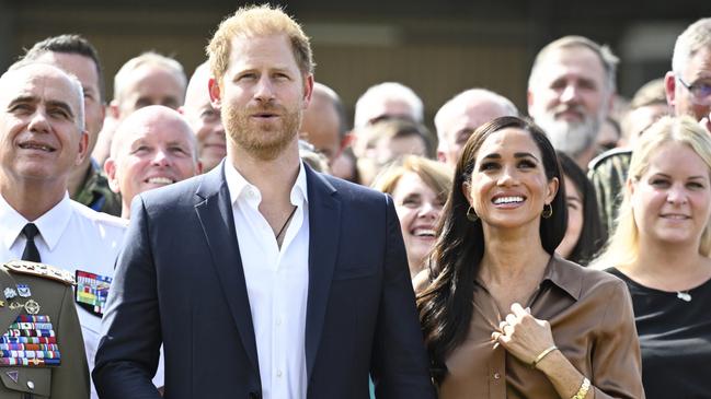 DUESSELDORF, GERMANY - SEPTEMBER 14: Prince Harry, Duke of Sussex and Meghan, Duchess of Sussex meet with NATO Joint Force Command and families from Italy and Netherlands during day five of the Invictus Games DÃÂ¼sseldorf 2023 on September 14, 2023 in Duesseldorf, Germany. (Photo by Sascha Schuermann/Getty Images for the Invictus Games Foundation)