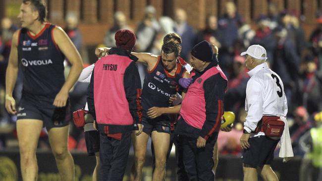 Norwood's Tom Forster is concussed after taking a heavy knock. Picture Dean Martin