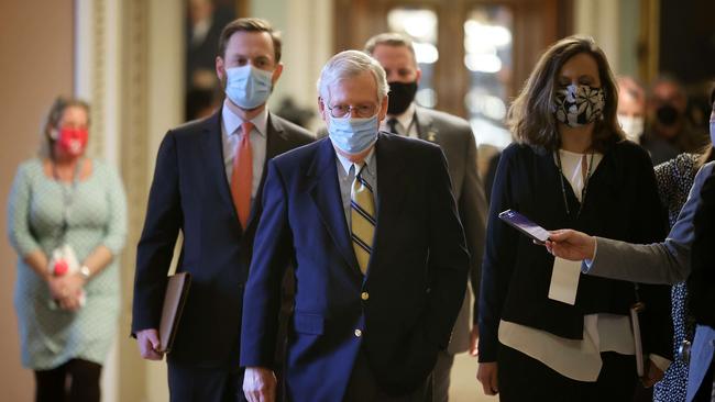 Mitch McConnell walks to his office at the conclusion of Donald Trump's impeachment trial. Picture: AFP