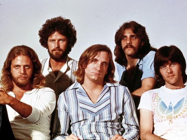 FILE: Randy Meisner, founding member of The Eagles, has died at 77. UNSPECIFIED - JANUARY 01:  Photo of Glenn FREY and Joe WALSH and Don HENLEY and Don FELDER and EAGLES and Randy MEISNER; L-R: Don Felder, Don Henley, Joe Walsh, Glenn Frey, Randy Meisner - posed, studio, group shot - Hotel California era  (Photo by RB/Redferns)