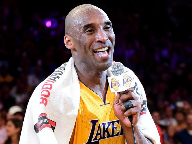 LOS ANGELES, CA - APRIL 13: Kobe Bryant #24 of the Los Angeles Lakers addresses the crowd after scoring 60 points in his final NBA game at Staples Center on April 13, 2016 in Los Angeles, California. The Lakers defeated the Utah Jazz 101-96. NOTE TO USER: User expressly acknowledges and agrees that, by downloading and or using this photograph, User is consenting to the terms and conditions of the Getty Images License Agreement.   Harry How/Getty Images/AFP == FOR NEWSPAPERS, INTERNET, TELCOS & TELEVISION USE ONLY ==