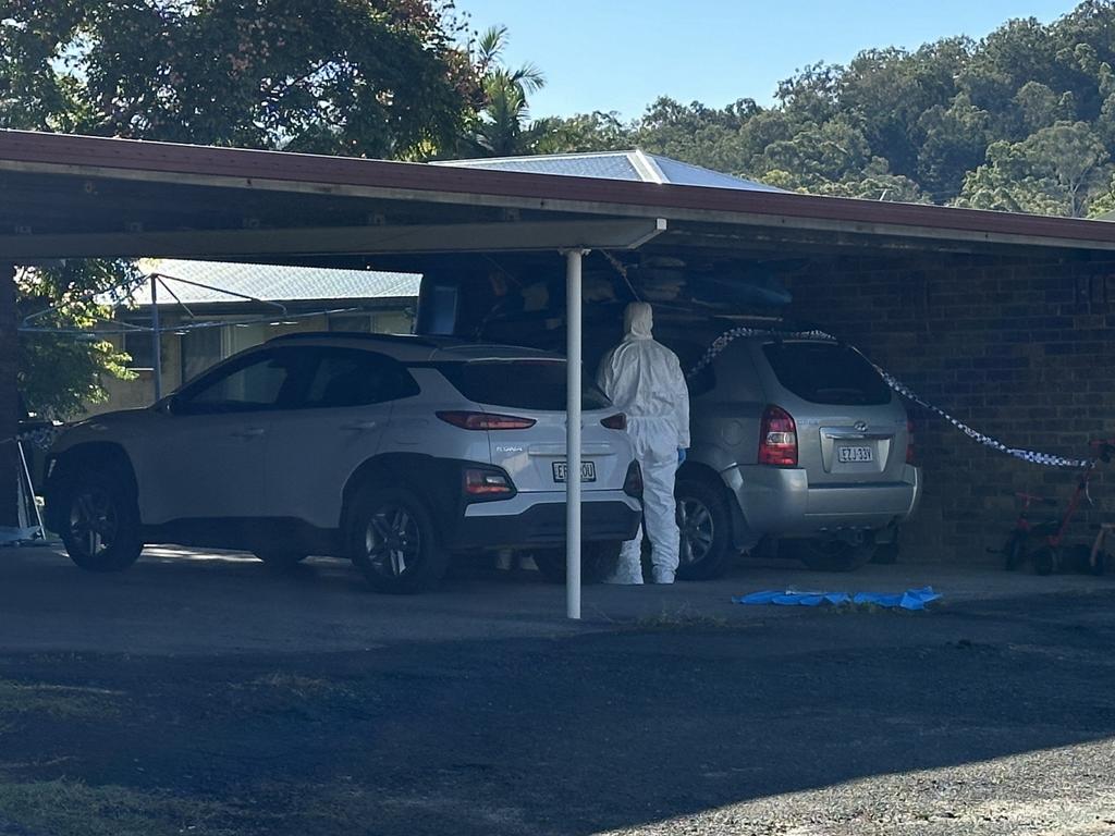 Police in College St, East Lismore following the discovery of the bodies. Picture: Cath Piltz