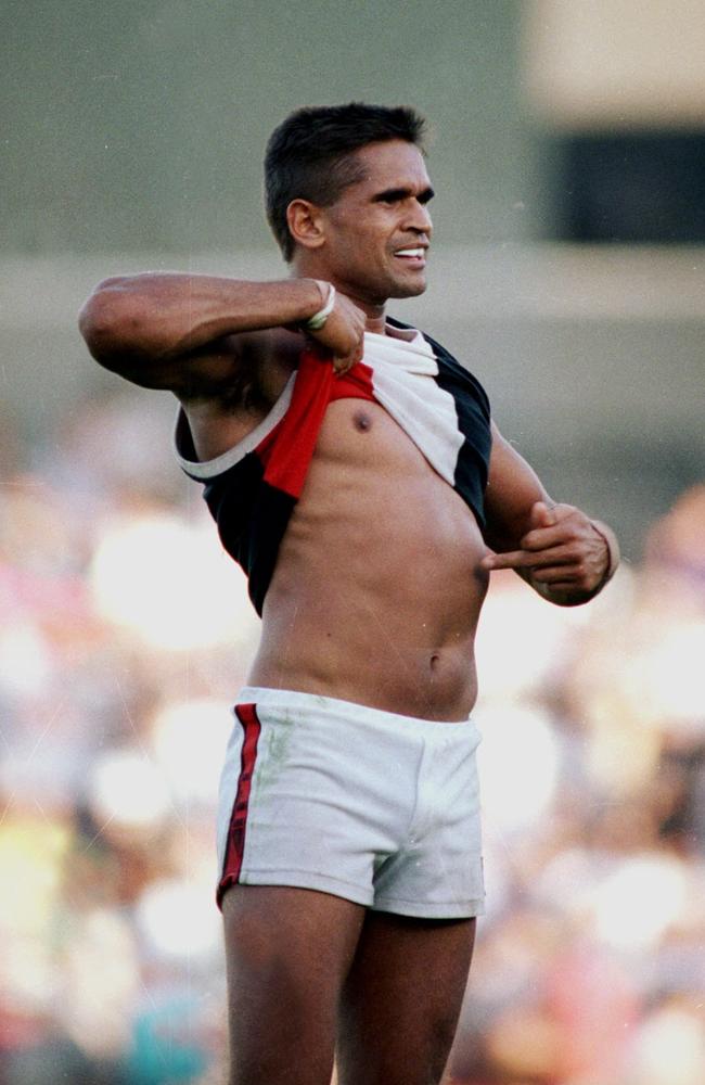 Nicky Winmar cemented his status as an anti-racism trailblazer when he lifted his guernsey and pointed at his skin after a match against Collingwood. Picture: John Feder