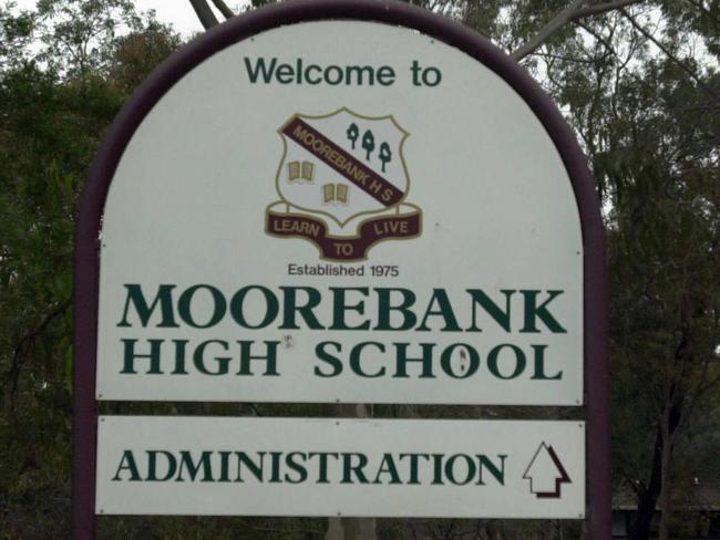 Drew Cremin of J.S.B.Plumbing repairing Down Pipe at Moorebank High School  with Principal Greg Anderson looking on at  the progress. 14.8.03 Pic Frank Violi