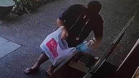 CCTV footage from Tobacco Supermart Southport shows the unidentified man shoving the complimentary sanitiser into a plastic bag.