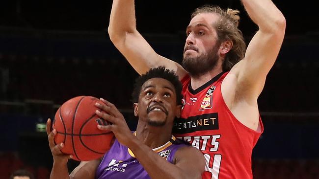 Sydney Kings stars Casper Ware drives to the basket against Jesse Wagstaff in game 3 of the NBL Finals. Picture: Getty Images