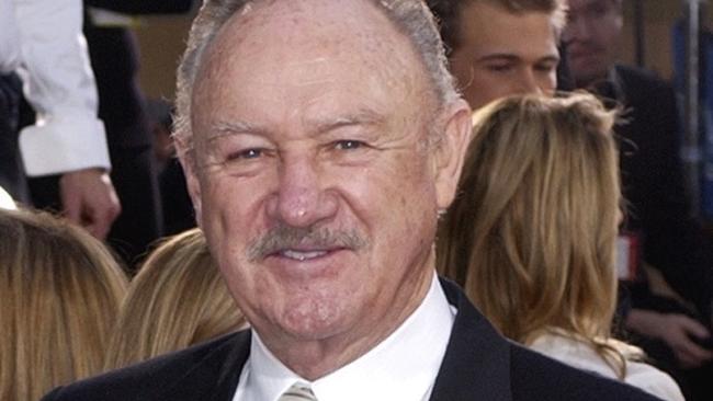 FILE - Actor Gene Hackman arrives with his wife, Betsy Arakawa, for the 60th Annual Golden Globe Awards in Beverly Hills, Calif., Sunday, Jan. 19, 2003. (AP Photo/Mark J. Terrill, File)