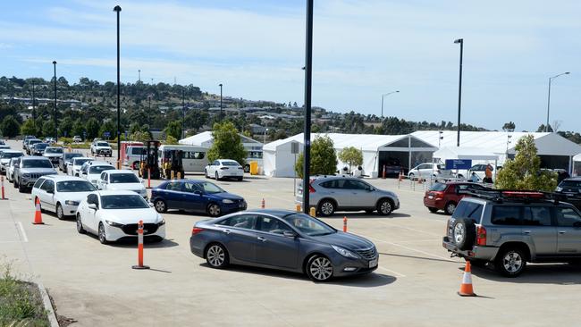 People queue at a COVID testing station in Sunbury. Picture: Andrew Henshaw