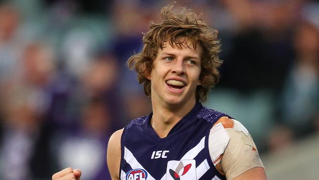 PERTH, AUSTRALIA - JULY 13: Nathan Fyfe of the Dockers celebrates a goal during the round 17 AFL match between the Fremantle Dockers and the Greater Western Sydney Giants at Patersons Stadium on July 13, 2014 in Perth, Australia. (Photo by Paul Kane/Getty Images)