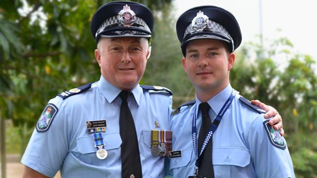 Townsville Senior Sergeant Scott Warrick and his son Kypton Warrick who recently graduated from the Townsville Police Academy. Picture: Natasha Emeck