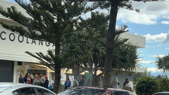 People being evacuated from The Strand at Coolangatta.