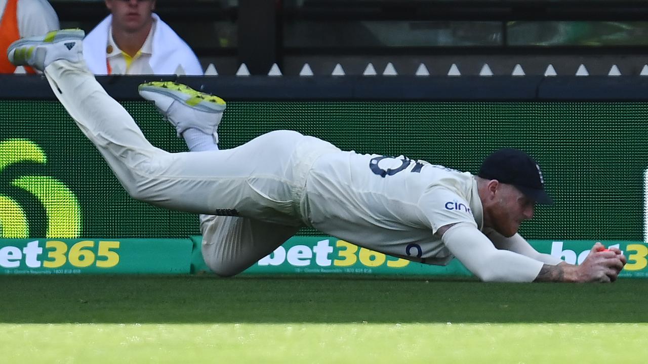 Ben Stokes of England takes a catch to dismiss Travis Head of Australia. Picture: Quinn Rooney