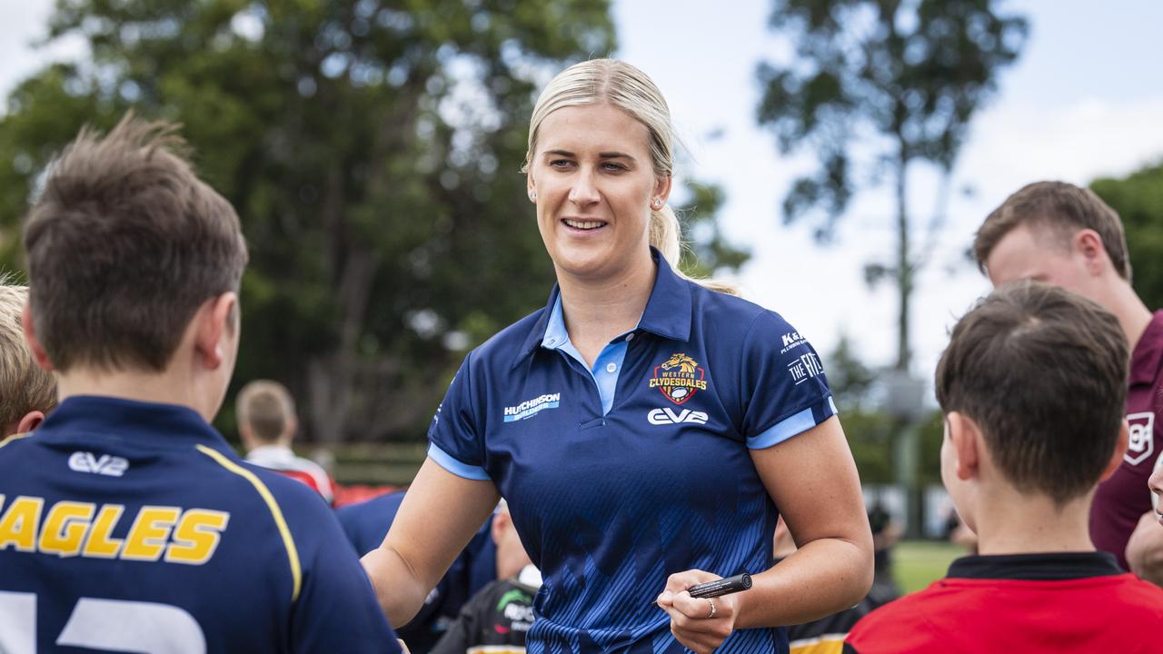 Local hero Shenae Ciesiolka signs autographs for Toowoomba Junior Rugby League players. Picture: Kevin Farmer