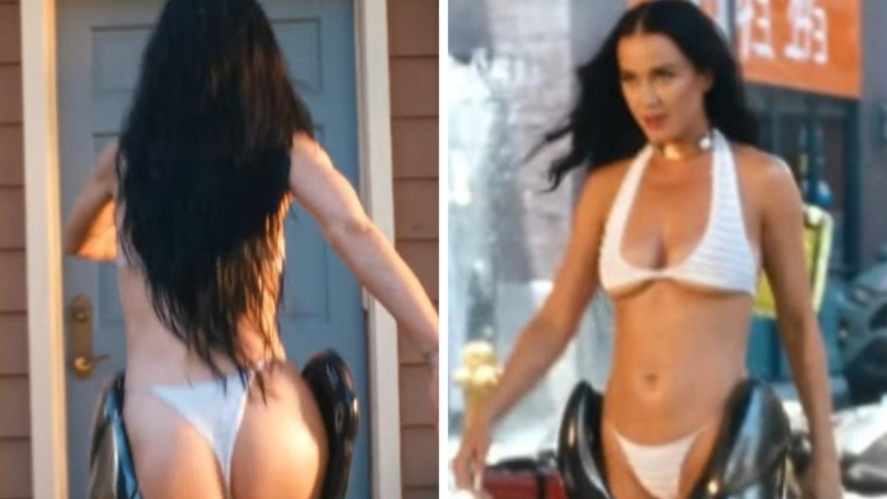 Katy Perry struts in G-string in racy Woman’s World music video