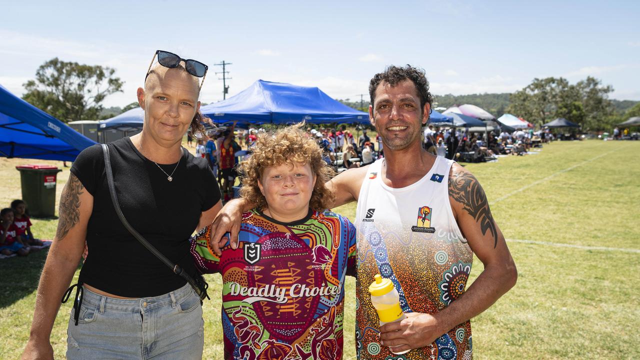 Chantelle Baker with Jahkai Jackson (centre) and Jaydon Dos Adams Memorial player Joe Chudleigh at the Warriors Reconciliation Carnival at Jack Martin Centre, Saturday, January 25, 2025. Picture: Kevin Farmer