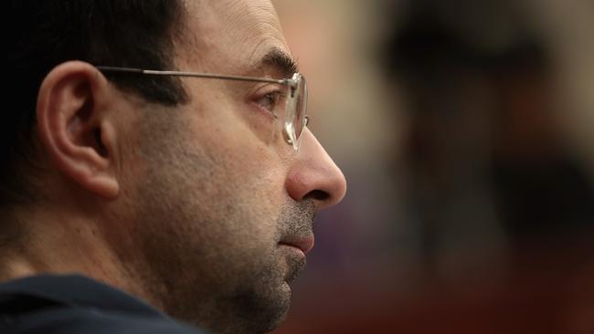 Disgraced sports doctor Larry Nassar listens to victim impact statements during his sentencing hearing. Picture: Scott Olson/Getty Images/AFP