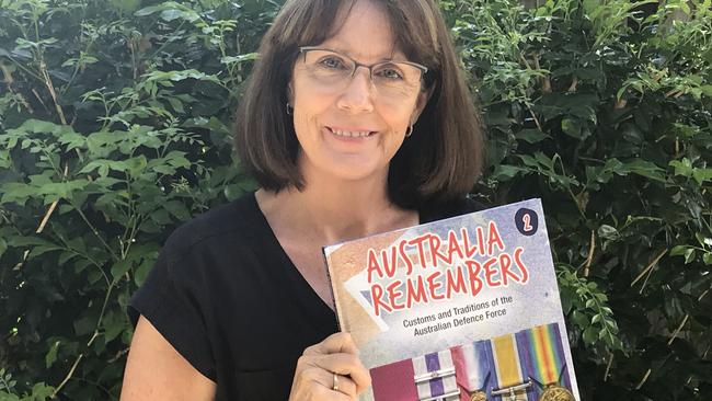 Author Allison Marlow Paterson with her new book <i><a href="https://www.bigskypublishing.com.au/books/australia-remembers-2-hb/" target="_blank">Australia Remembers: Customs and Traditions of the Australian Defence Force</a></i>. She will speak on Anzac Day at the Mologa war memorial.