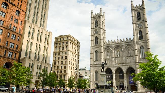 The Gothic Revival Notre-Dame Basilica and Maisonneuve Monument.