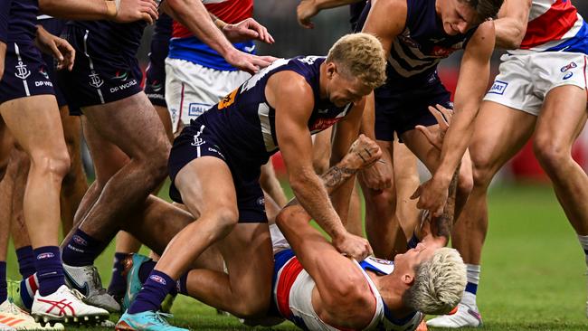 Corey Wagner of the Dockers wrestles with Rory Lobb (Photo by Daniel Carson/AFL Photos via Getty Images)