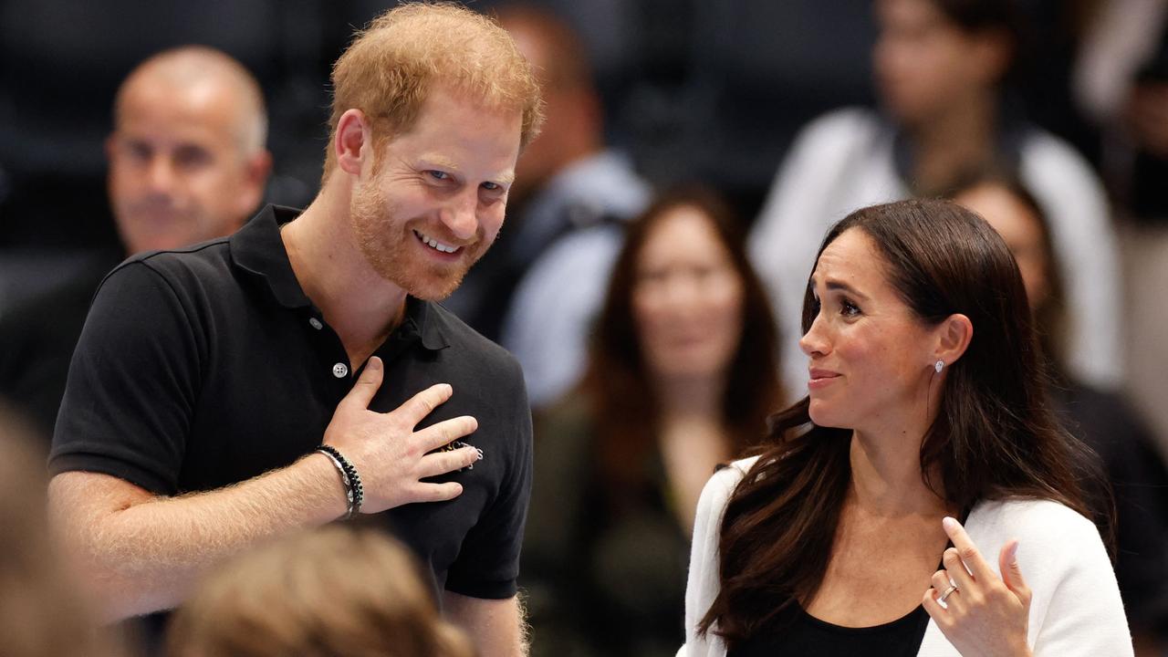 Britain's Meghan, Duchess of Sussex and Britain's Prince Harry, Duke of Sussex, attend a children's event at the 2023 Invictus Games in Duesseldorf, western Germany on September 13, 2023. The Invictus Games, an international sports competition for wounded soldiers founded by British royal Prince Harry in 2014 run from September 9 to 16, 2023 in Duesseldorf. (Photo by Odd ANDERSEN / AFP)