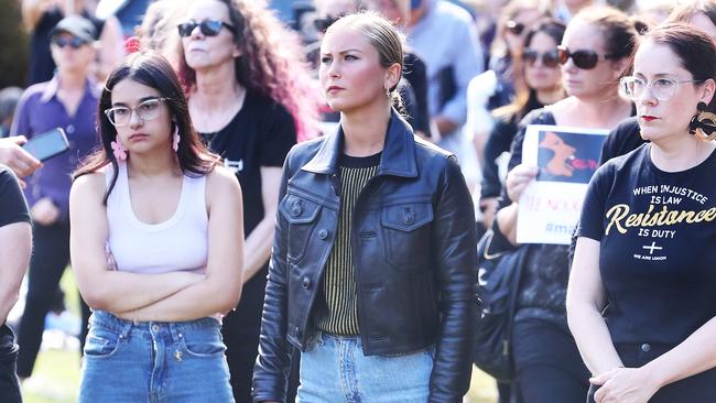 Grace Tame, centre, outside Parliament House in Canberra on Monday. Picture: Nikki Davis-Jones