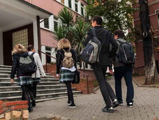 Turkish students walking to school. Cold autumnal morning. Nikon D3x, full frame, XXXL.