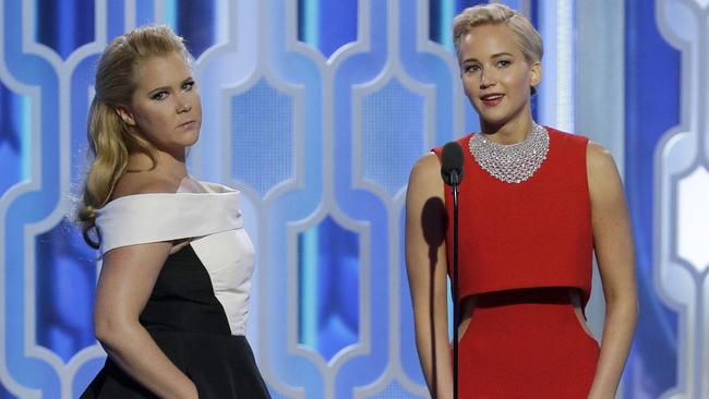 Amy Schumer and Jennifer Lawrence at the Golden Globe Awards.