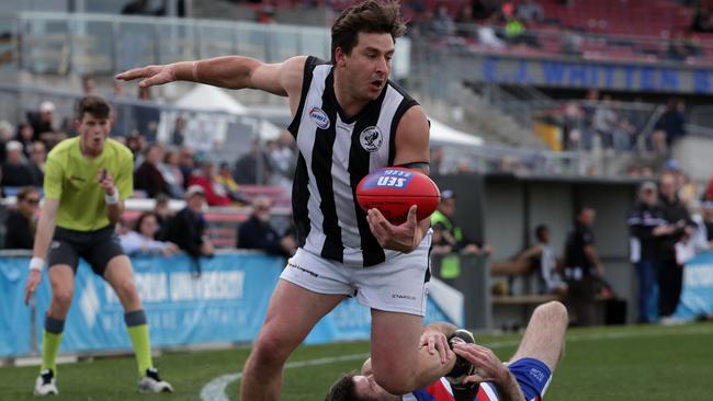 Jordan Garita gathers the footy for Parkside. Picture: Mark Dadswell