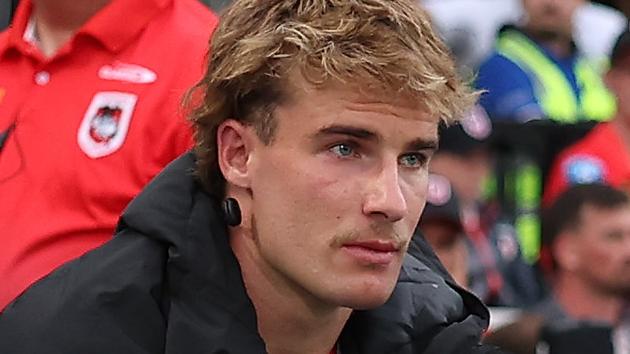 SYDNEY, AUSTRALIA - MARCH 08:  Ryan Couchman of the Dragons watches the game from the players bench after a knee injury during the round one NRL match between St George Illawarra Dragons and Canterbury Bulldogs at Netstrata Jubilee Stadium, on March 08, 2025, in Sydney, Australia. (Photo by Mark Metcalfe/Getty Images)