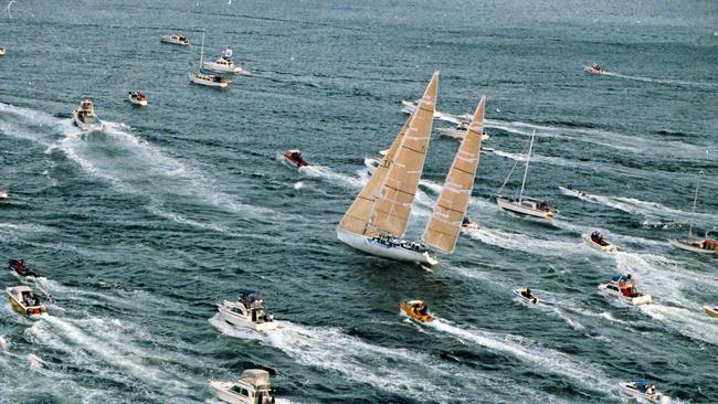 Bob Clifford's maxi-yacht Tasmania heads up the River Derwent to take line honours in the 50th anniversary race in 1995.