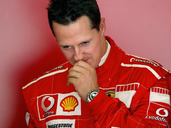 (FILES) In this file photo taken on October 12, 2006 seven-time world Formula One champion Michael Schumacher ponders during a training session at the Jerez recetrack. - Absolute reference of the Formula 1, Michael Schumacher, will turn 50 years old on January 3, 2019. The seven-time world champion was victim five years ago, on December 29, 2013 of a ski accident, leaving him in a precarious state of health. The family never wanted to communicate on the matter but according to renowned neurologists, the German pilot, technically out of the coma, might be in a vegetative state. (Photo by JOSE LUIS ROCA / AFP)