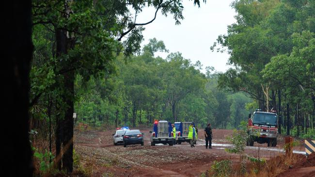 Police near the scene of a plane crash off Gunn Point Road.