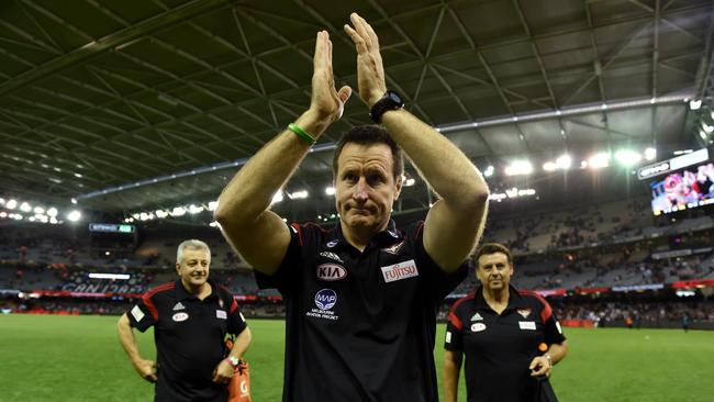 Essendon coach John Worsfold leaves the field after his side’s loss to the Kangaroos. Picture: AAP Image/Tracey Nearmy
