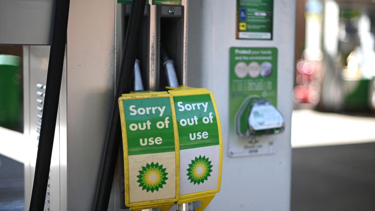 Out of use signs are attached to pumps at a BP petrol station in west London.